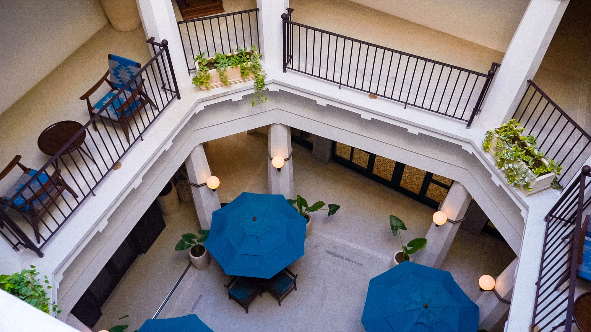 Aerial view of the courtyard with blue umbrellas, Las Catalinas, Costa Rica