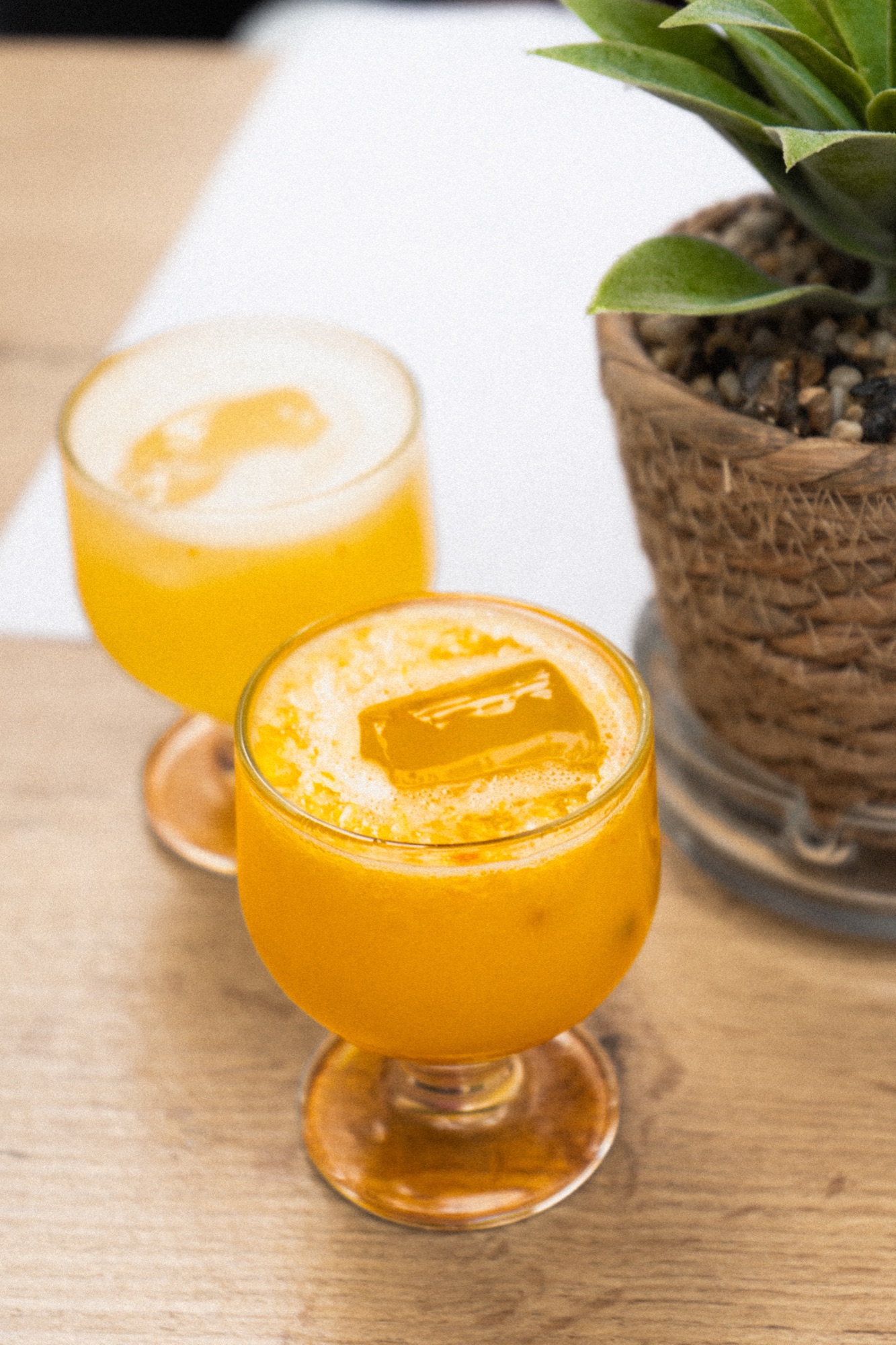 Two poncha cocktails on a café table, Madeira, Portugal