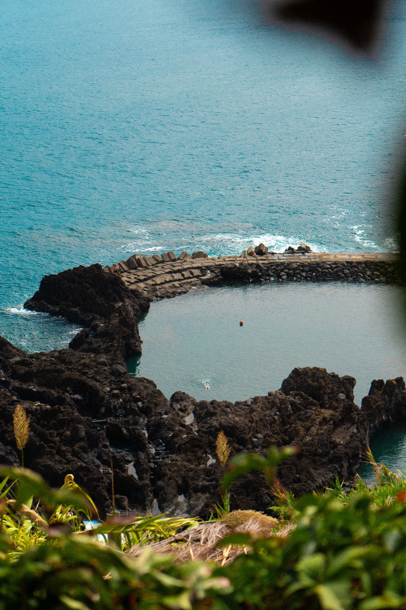 Natural volcanic swimming pool along the coastline, Madeira, Portugal