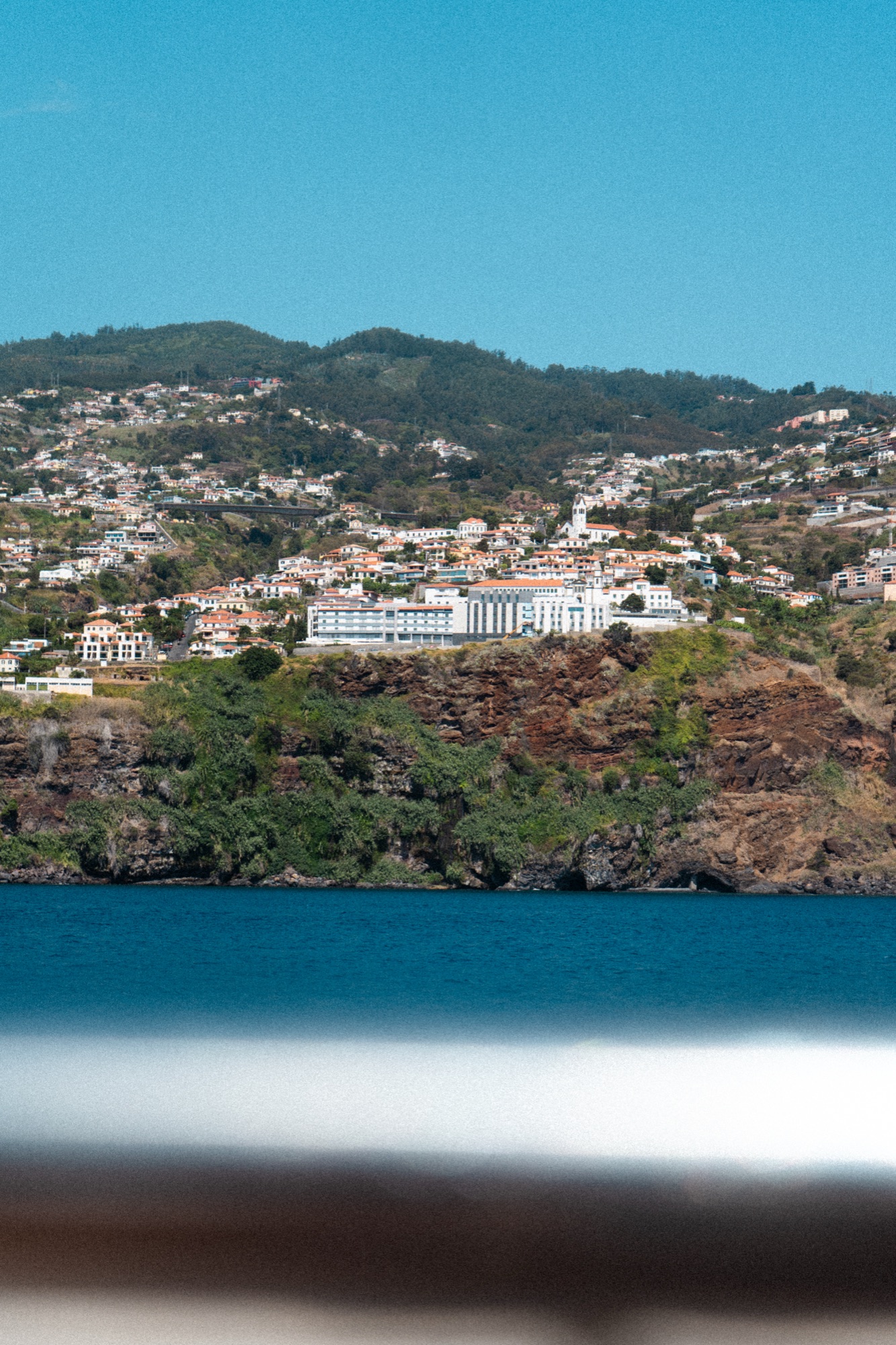 Aerial view of Funchal's hillside town from the water, Madeira, Portugal